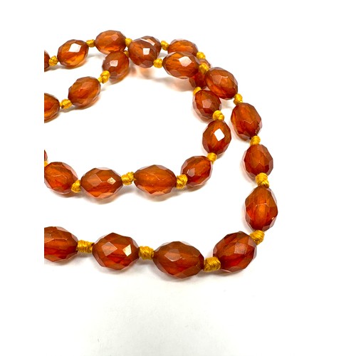 478 - Antique Amber necklace individually knotted (19g)