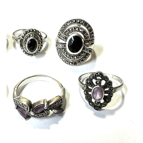 325 - A collection of silver marcasite rings including Amethyst (31g)