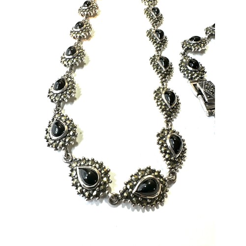 329 - Silver marcasite and Onyx jewellery set (65g)