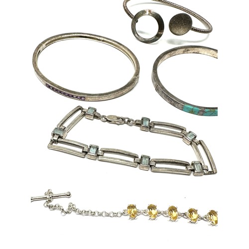 346 - A collection of silver bracelets & bangles including gemstone (60g)