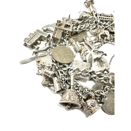 317 - Silver charm bracelet including animal charms (149g)