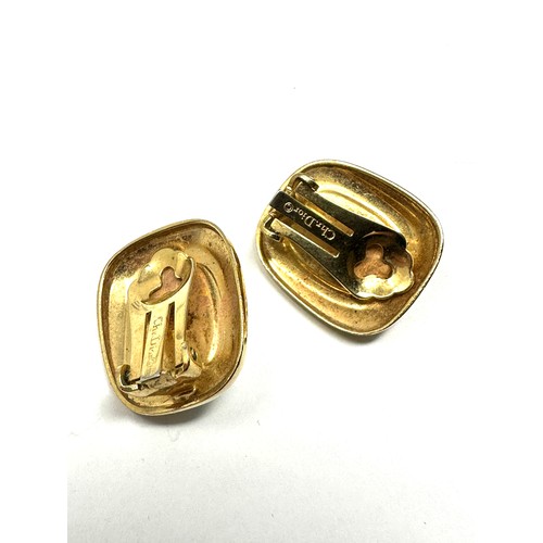 479 - Pair of gold tone clip on earrings by designer Christian Dior (14g)