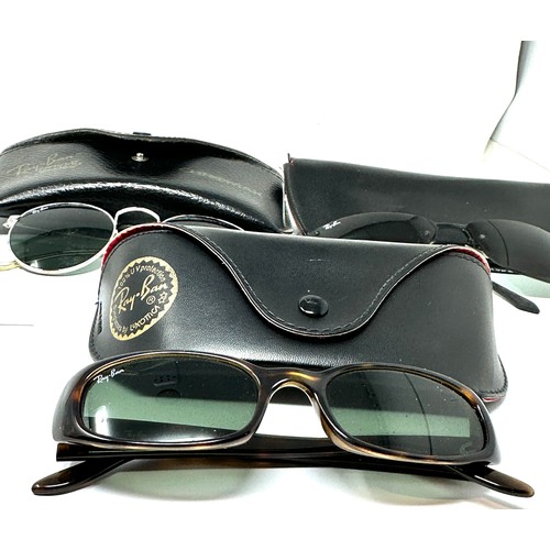 424 - Selection of cased Ray-ban sunglasses Items are in previously owned condition  
Signs of age & wear ... 