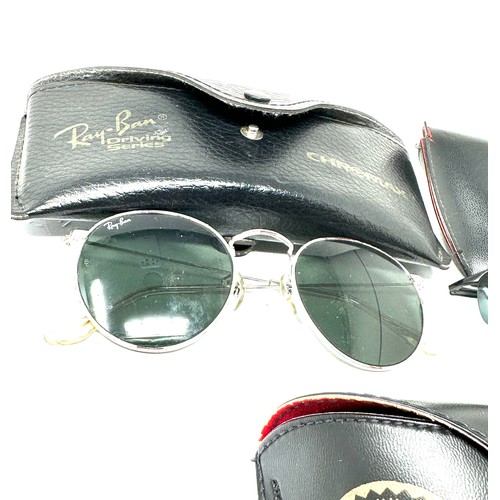 424 - Selection of cased Ray-ban sunglasses Items are in previously owned condition  
Signs of age & wear ... 