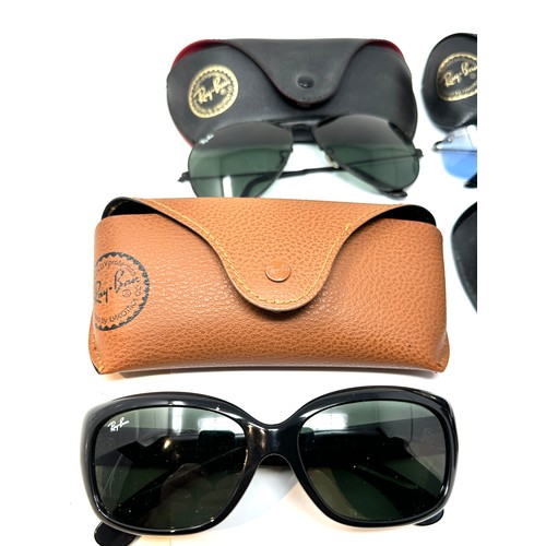 423 - selection of cased Ray-ban sunglasses Items are in previously owned condition  
Signs of age & wear ... 