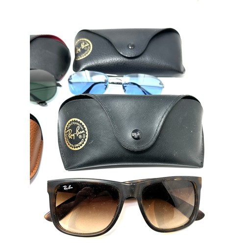 423 - selection of cased Ray-ban sunglasses Items are in previously owned condition  
Signs of age & wear ... 