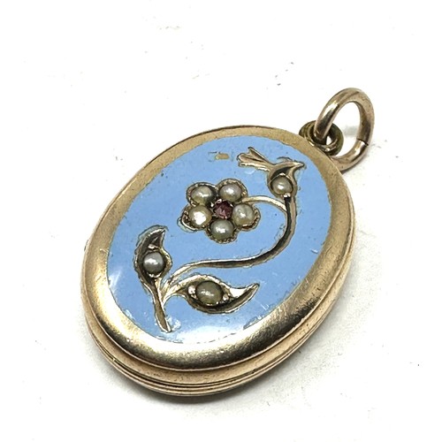 162 - Antique 9ct gold back and front seed pearl. garnet and blue enamel set locket (7.1g)