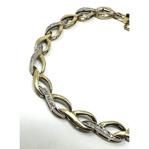 200 - 9ct gold diamond set ornate link bracelet (9.9g)