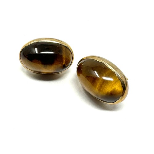 167 - 9ct gold tigers eye cabochon set stud earrings (5.9g)