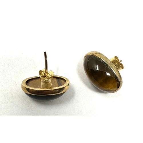 167 - 9ct gold tigers eye cabochon set stud earrings (5.9g)