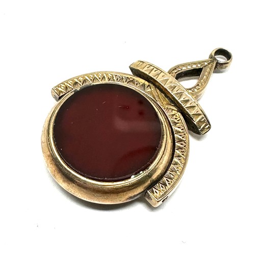 145 - Antique 9ct gold carnelian and bloodstone set spinner fob (10.7g)