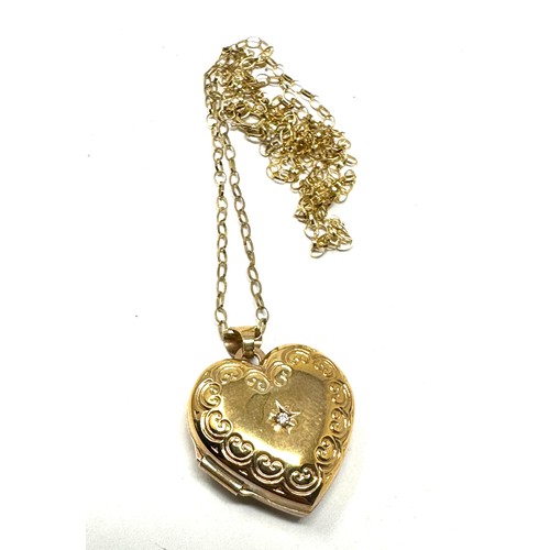 157 - 9ct gold diamond set heart shaped locket pendant necklace (2.8g)