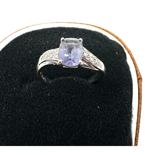 135 - 9ct gold iolite & diamond ring (2.8g)