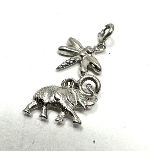 121 - 2 x 9ct white gold animal charms inc. dragonfly & rhino (1.7g)