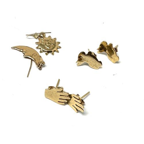 92 - 3 x 9ct gold earrings inc. sun, moon & hands (3.2g)