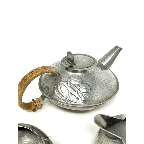 1 - Archibald Knox for Liberty & Co. Tudric pewter  three piece tea set no.0231 The teapot measures appr... 