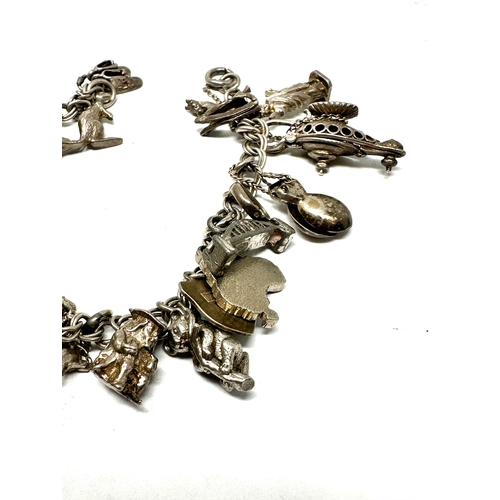 296 - Vintage silver charm bracelet weight 54g