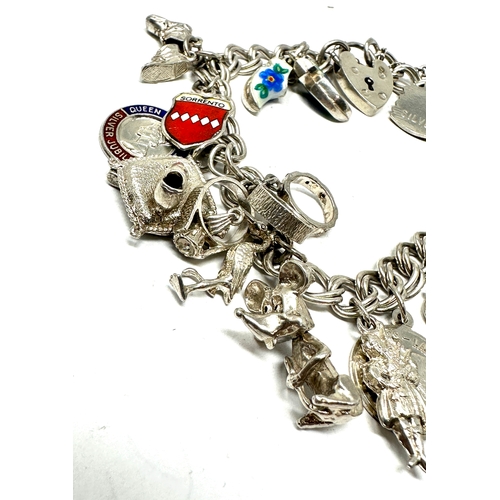 298 - Vintage silver charm bracelet weight 46g