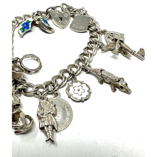 298 - Vintage silver charm bracelet weight 46g