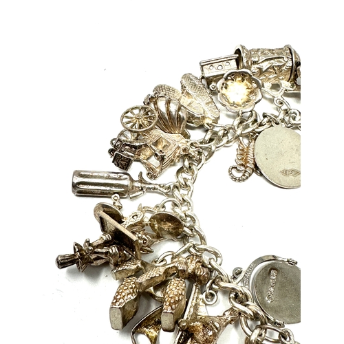 299 - Vintage silver charm bracelet weight 114g