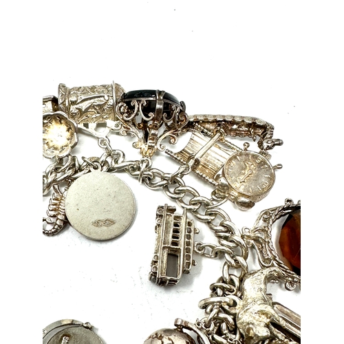 299 - Vintage silver charm bracelet weight 114g