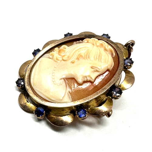 57 - Vintage 9ct gold & blue stone  set ornate framed cameo pendant brooch measures approx 4.5cm drop by ... 