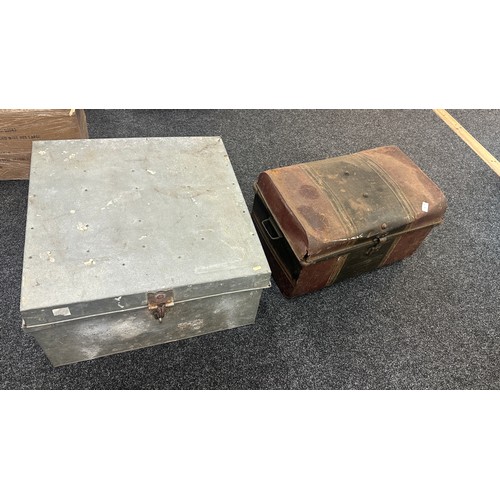 261 - 2 Large metal trunks measures approximately 25 inches square 14 inches tall