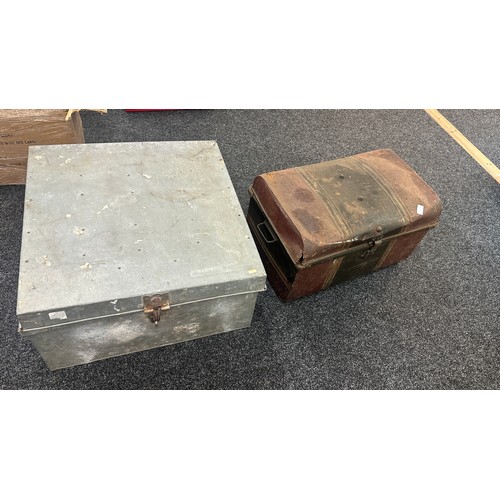 261 - 2 Large metal trunks measures approximately 25 inches square 14 inches tall