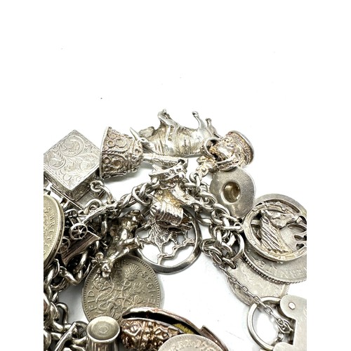 317 - Silver charm bracelet including animal charms (149g)