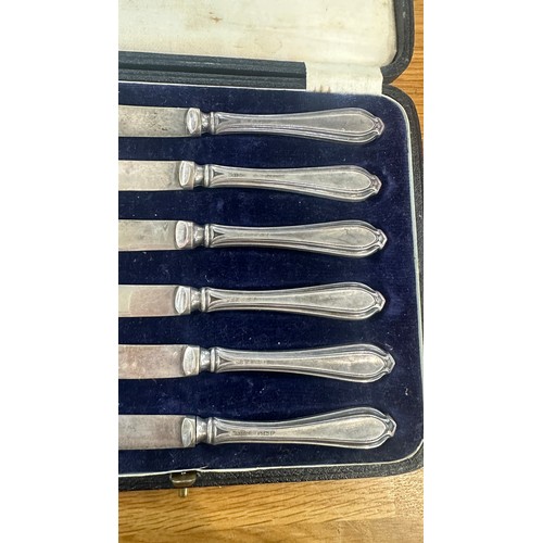 426 - Cased silver handled knife set