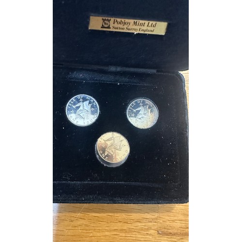 443 - Boxed Pobjoy mint trio coin set includes platinum and silver coins