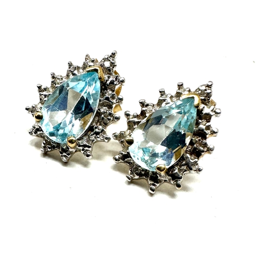 66 - 9ct gold diamond & topaz earrings weight 2.1g