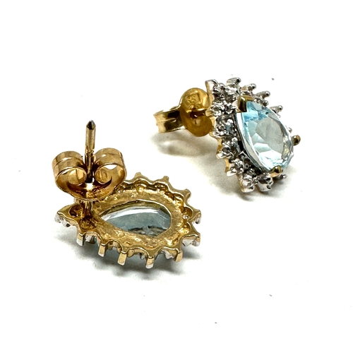 66 - 9ct gold diamond & topaz earrings weight 2.1g