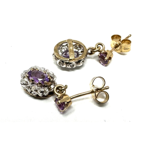 69 - 9ct gold diamond & amethyst earrings weight 2g