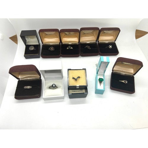 545 - Large selection of boxed silver, stone set and costume rings