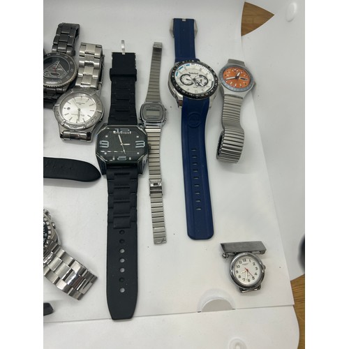 Large selection of assorted wristwatches includes Hugo boss, swatch ...