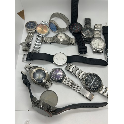 Large selection of assorted wristwatches includes Hugo boss, swatch ...