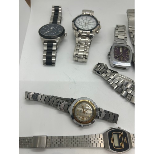 526 - Large selection of assorted wristwatches includes Hugo boss, swatch, ben sherman, police etc, all un... 