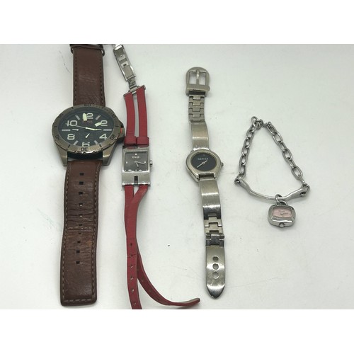 517 - Selection of 4 watches includes Hugo boss, Gucci etc, untested