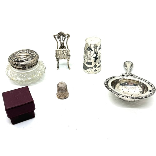 432 - Selection of silver items includes tea strainer, trinket pot etc