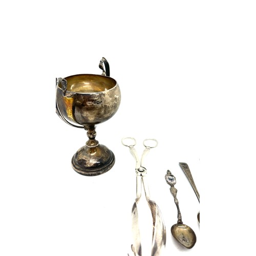 375 - Selection of silver and silver plated items includes silver trophy, silver plated walker and hall et... 