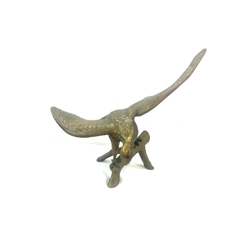 268 - Large brass hollow eagle figure, measures approximately 20 inches tall 26 inches wide