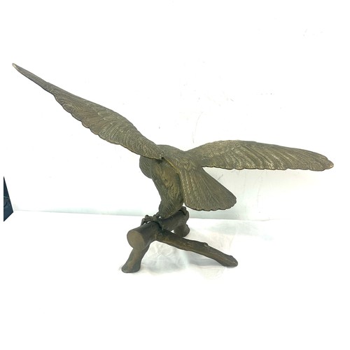 268 - Large brass hollow eagle figure, measures approximately 20 inches tall 26 inches wide