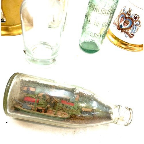 215 - Large selection of empty display bottles