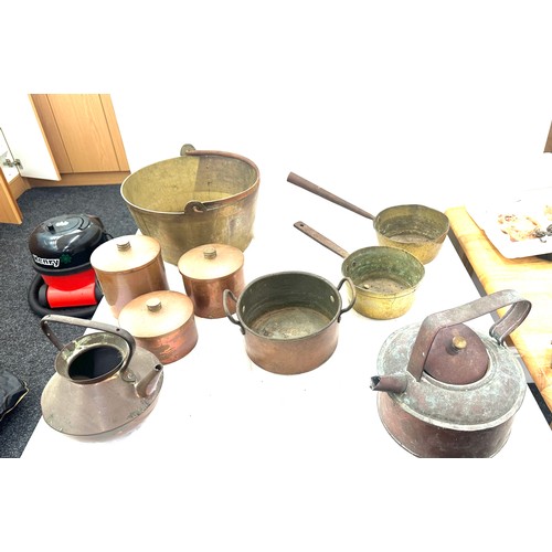 221 - Large selection of vintage brass and copper pans, kettles etc