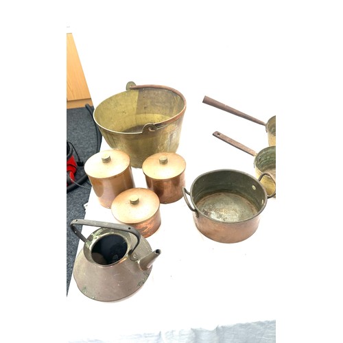 221 - Large selection of vintage brass and copper pans, kettles etc