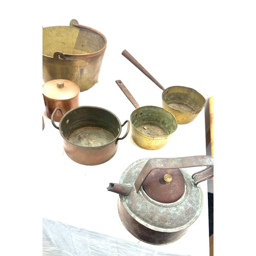 221 - Large selection of vintage brass and copper pans, kettles etc