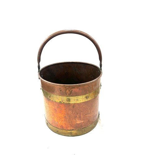 245 - Vintage brass and copper bucket, measures approximately 17 inches tall 12 inches diameter