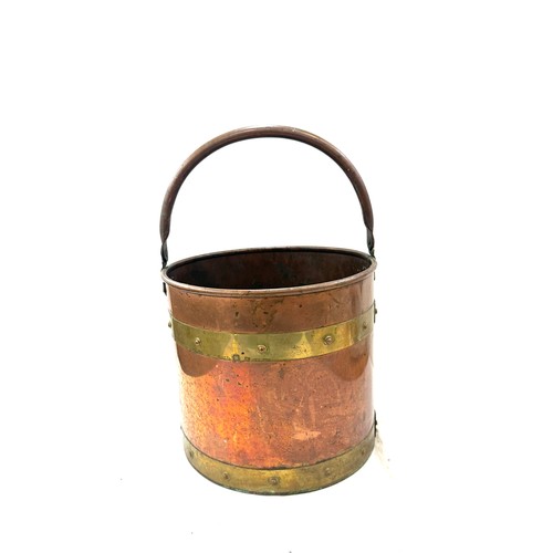 245 - Vintage brass and copper bucket, measures approximately 17 inches tall 12 inches diameter