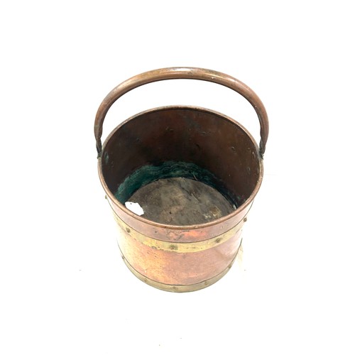 245 - Vintage brass and copper bucket, measures approximately 17 inches tall 12 inches diameter